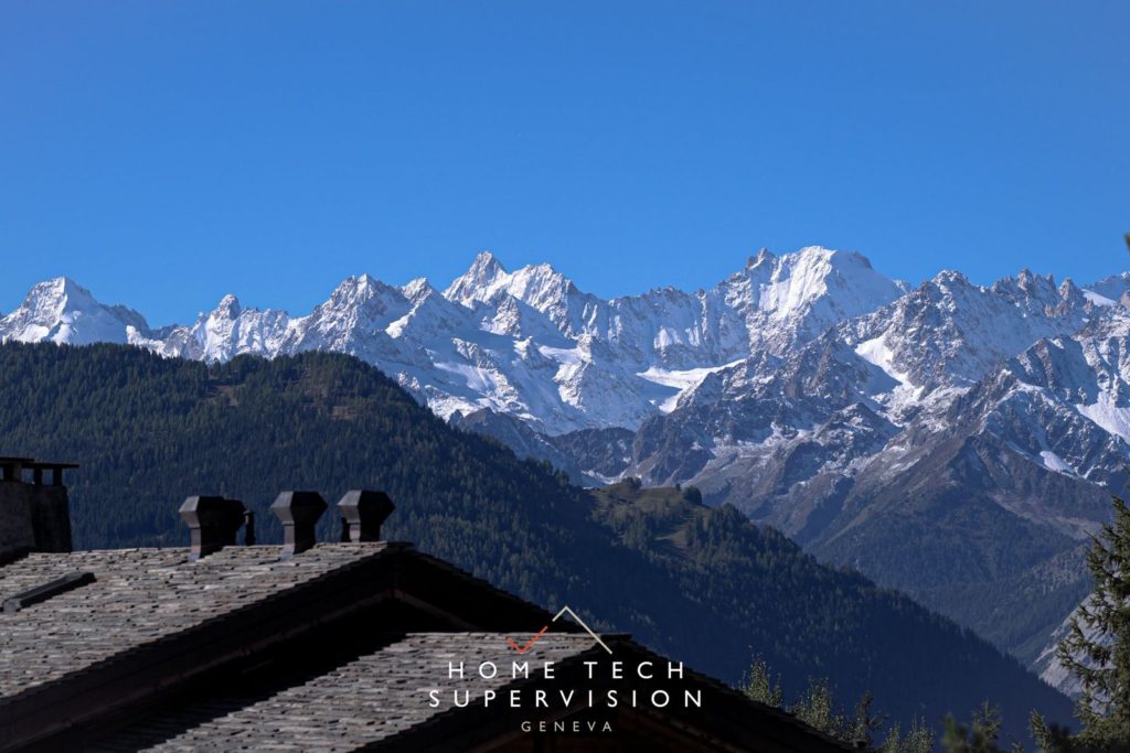 Chalet face aux Alpes valaisannes